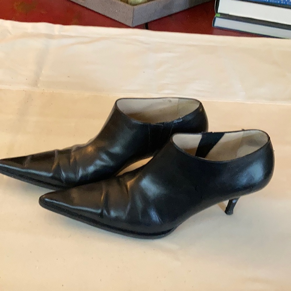Designer high heel shoe boot. Made in Italy size is 11.